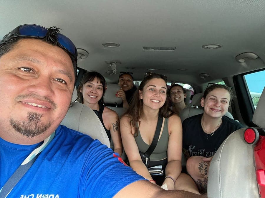 Full van of happy travelers heading to Holbox with Go Holbox Shuttle